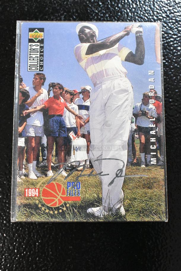 Signed 1994 Pro Files Collector's Choice Michael Jordan golf card, featuring Jordan in action. Upper Deck brand.
