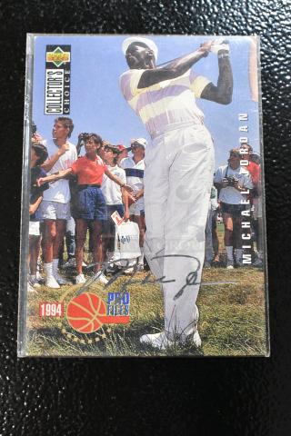 Signed 1994 Pro Files Collector's Choice Michael Jordan golf card, featuring Jordan in action. Upper Deck brand.