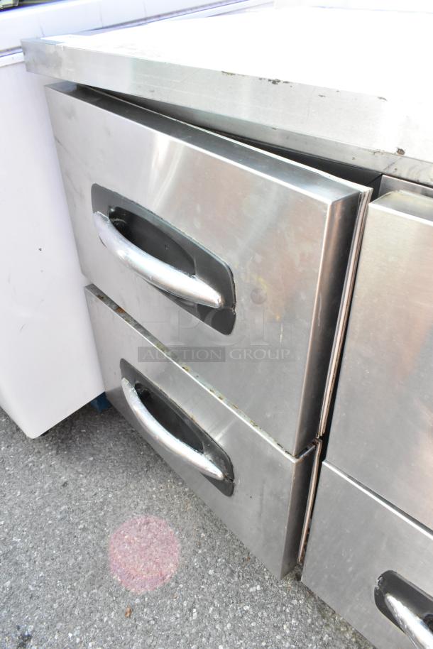 Norlake UR72 stainless steel 6-drawer undercounter cooler with commercial casters, showing drawer handles. 115V, 1 Phase.