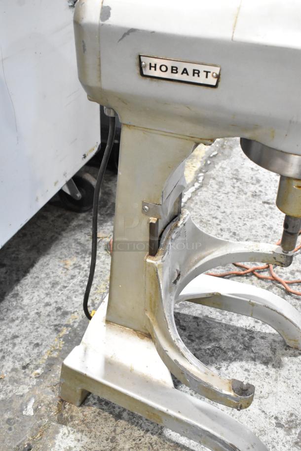 Hobart 20 Quart Commercial Dough Mixer, metal, 115V, 1 phase, tested and working, visible wear, Hobart label attached.