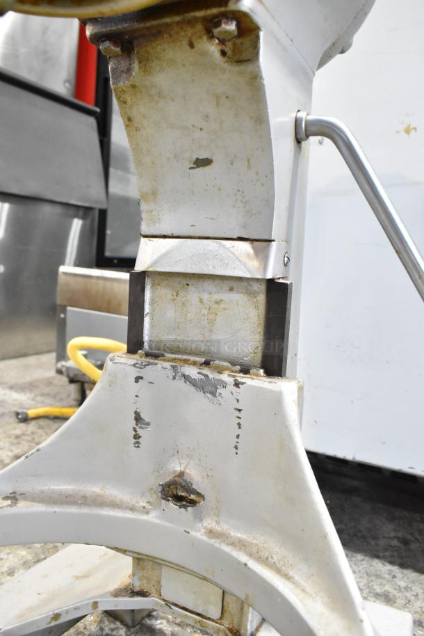 Hobart 20-quart commercial dough mixer base, metal frame with visible wear and patina. 115 volts, 1 phase. Tested, working.