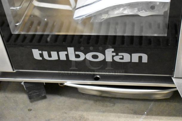 Brand new Moffat Turbofan EHT10 stainless steel mobile heated cabinet on casters, 208V, 1 phase, minor scratches.