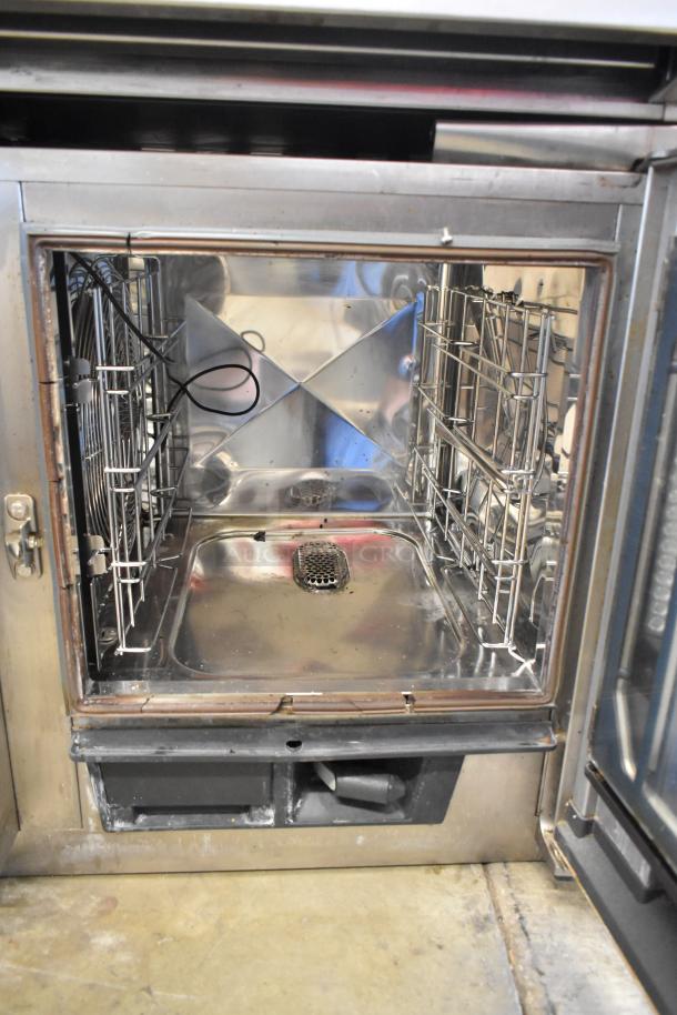 Rational SCCXS62/3E SelfCookingCenter XS, stainless steel, commercial combi convection oven, internal view, 208V, 3-phase.