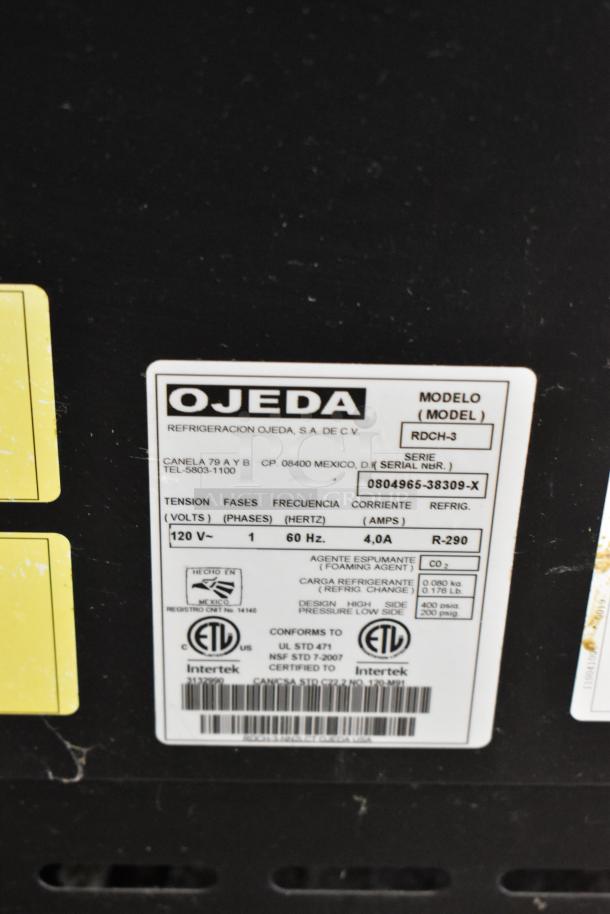 Ojeda RDCH-3 metal commercial deli display case label showing specs: 120V, 1 phase, model info, ETL certified.