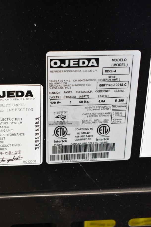 Ojeda RDCH-4 metal commercial deli display case label, 120V, 1 phase, ETL certified, showing specs and serial number.