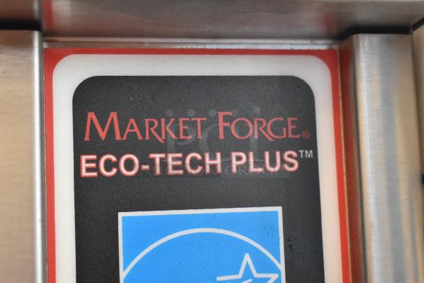 Market Forge ETP-10G Eco-tech Plus label on stainless steel steam cabinet; features commercial casters.