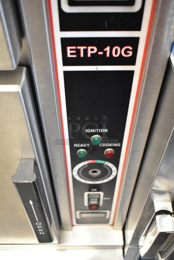 Market Forge ETP-10G Eco-tech Plus stainless steel steam cabinet controls, showing ignition and readiness indicators.