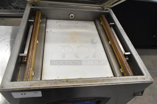VacMaster VP545 Vacuum Sealer, commercial model on casters, stainless steel, 110V, visible wear and residue, model label present.