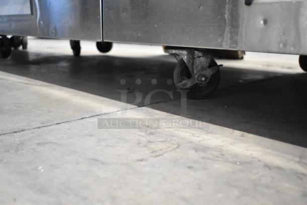 Turbo Air stainless steel 4-drawer chef base with commercial casters, 115 volts, in used condition.