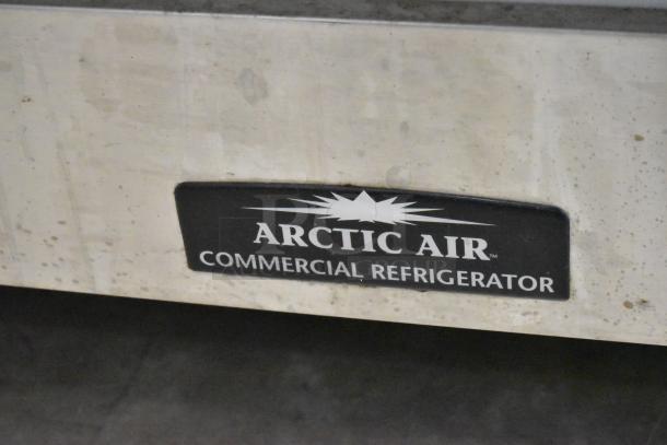 Arctic Air commercial single door reach-in freezer label, showing brand name. Metal surface, appears used.