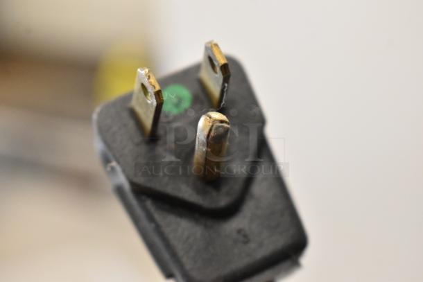 Plug close-up of Arctic Air Metal Commercial Freezer, 115 Volts, 1 Phase.