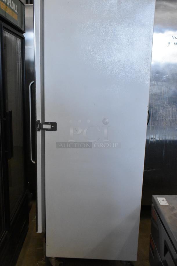 Arctic Air commercial single door reach-in freezer, on casters, 115 volts, metal exterior, used condition.