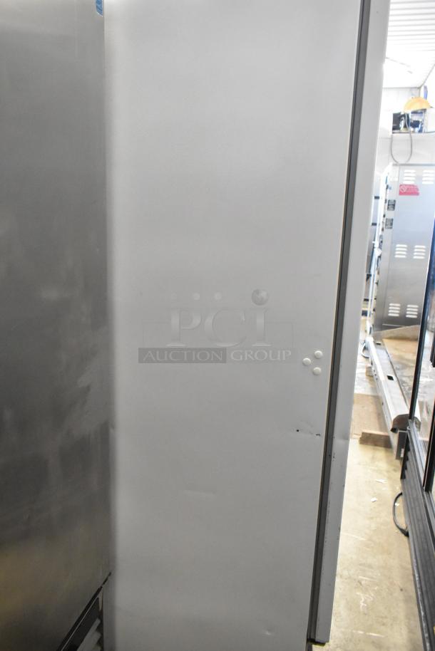 Arctic Air commercial single door reach-in freezer with metal exterior, on casters. Operates at 115 volts, 1 phase.