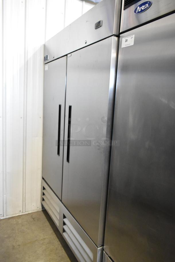 Arctic Air AR49EZ stainless steel 2 door commercial cooler with poly coated racks on casters, 115 volts, 1 phase.