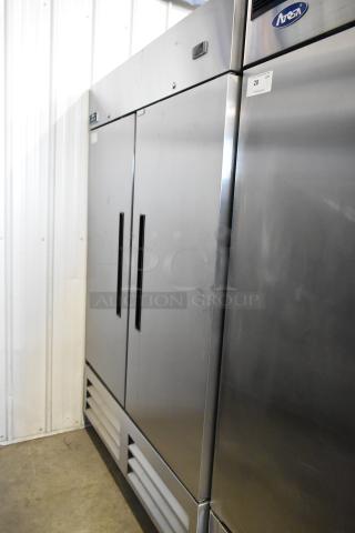 Arctic Air AR49EZ stainless steel 2 door commercial cooler with poly coated racks on casters, 115 volts, 1 phase.