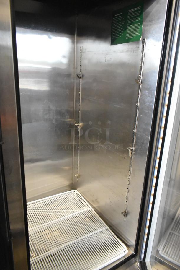 2016 Atosa MCF8707 stainless steel 2-door cooler, poly-coated racks, adjustable shelving, good condition, on casters.