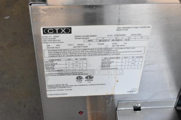 Middleby Marshall DZ33T commercial conveyor pizza oven label, showing voltage, phase, clearance specs. Stainless steel casing.
