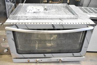 BRAND NEW 2025 KoolMore KM-CTCO-44 stainless steel commercial convection oven. Scratch and dent condition. Model visible.