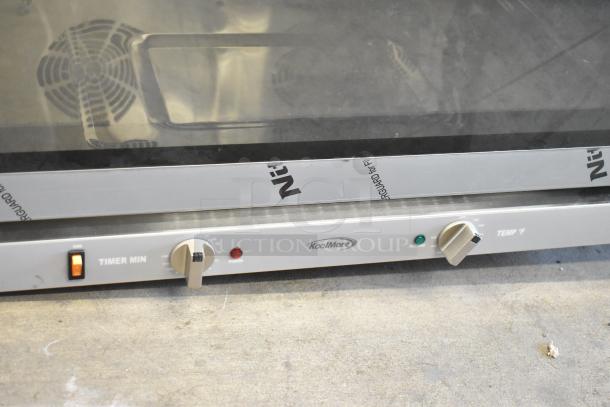 Brand new 2025 KoolMore KM-CTCO-44 stainless steel convection oven. Scratch and dent condition, with visible dials and logo.