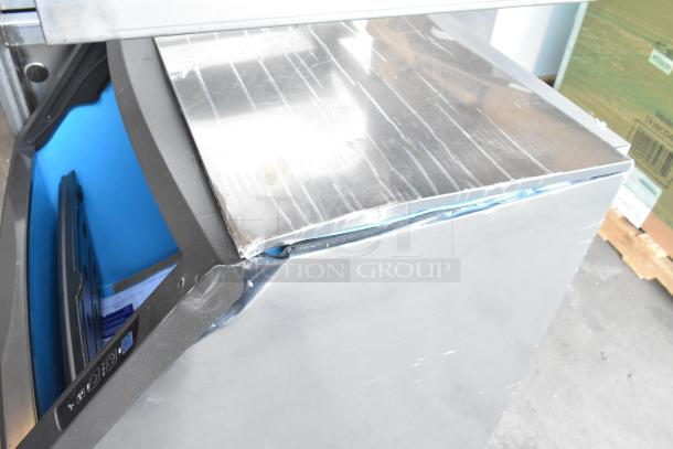 BRAND NEW 2024 Manitowoc UYF0190A-161B stainless steel ice machine, minor scratches, undercounter design, 200 lb. capacity.