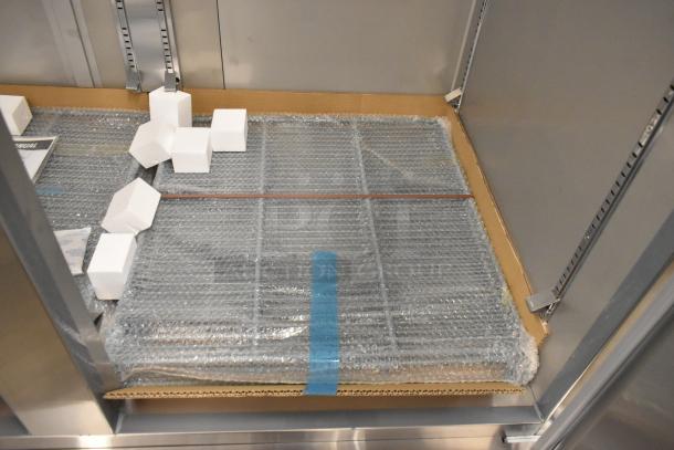 2025 KoolMore RIR-2D-SS Stainless Steel Reach-In Cooler, poly coated racks, bubble wrap, minor dents, 115V, 1 Phase.