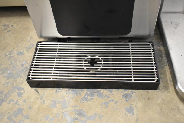 Brand new Narvon 23BCWD8HT water dispenser. Offers hot, chilled, ambient, and sparkling options. Minor scratches.
