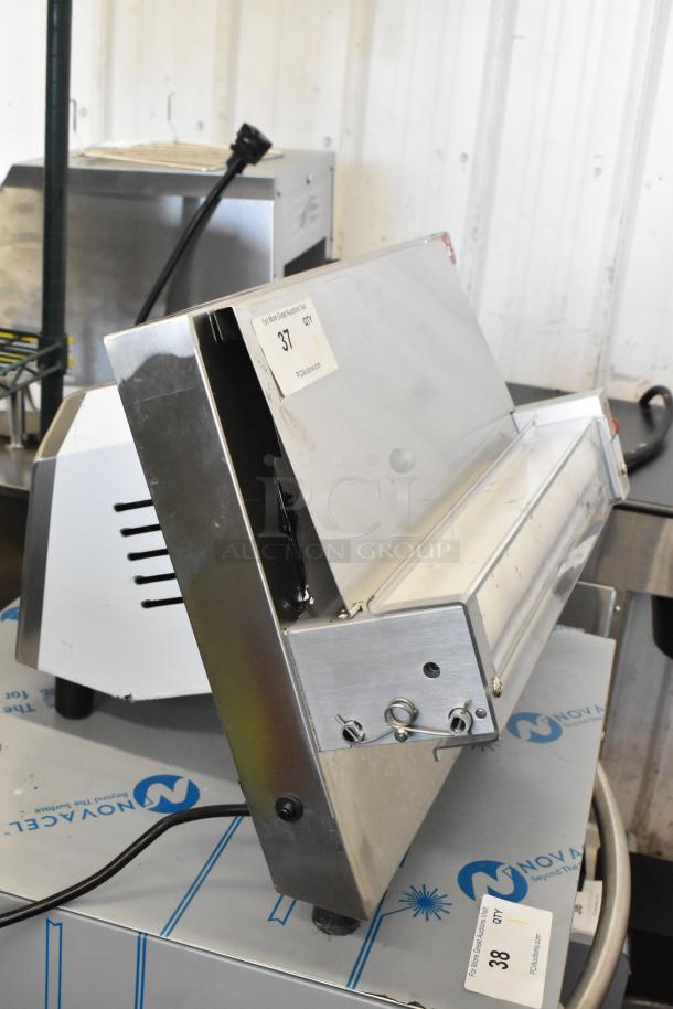 BRAND NEW Estella 348EDS18S stainless steel dough sheeter, 18" countertop model, 120V, 1 Phase, with scratches and dents.