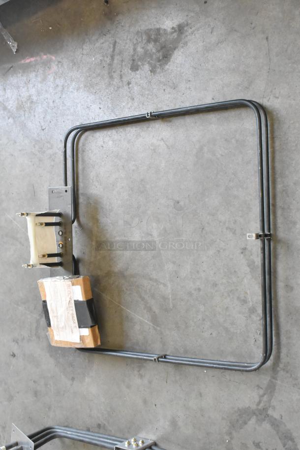 Brand new Blodgett 8595 Element Assy 240v 5000w and Burner, showing original packaging and intact condition.