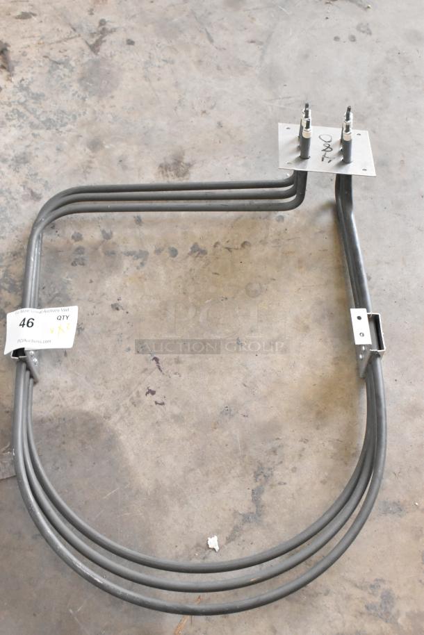 Brand new Blodgett 8595 Element Assy 240v 5000w. Visible auction tag reads "46 QTY 2". Slight scratch and dent condition.