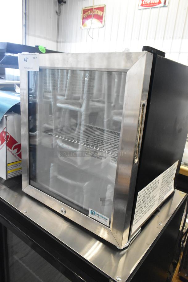 BRAND NEW SCRATCH AND DENT Excellence EMM-2HC black countertop display refrigerator, 1.8 cu. ft., with swing door.