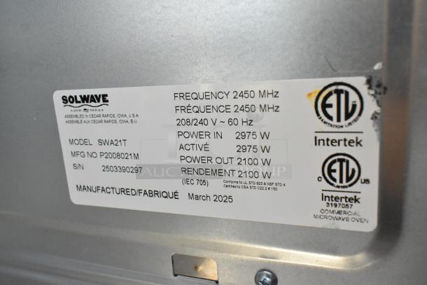 Solwave SWA21T commercial microwave label, displaying model info, power specs, and certification details. March 2025.