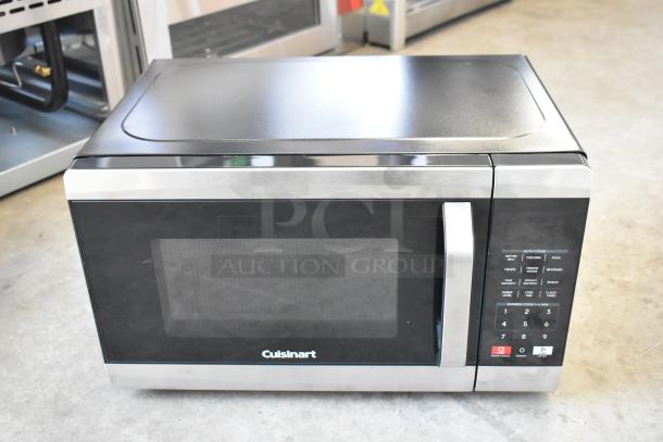 Brand new Cuisinart CMW-70WH compact microwave oven. Scratch and dent. 120 Volts, 1 Phase. Black and silver finish.