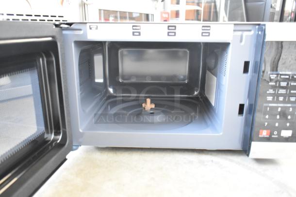Cuisinart CMW-70WH Compact Microwave Oven, brand new with scratch and dent. 120 Volts, 1 Phase, open door view.
