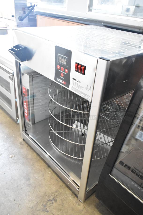 BRAND NEW ServIt 423PDW18D1 stainless steel 18" countertop display warmer, 4 shelves, digital controls, 120V, 1 phase.