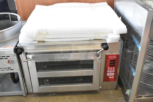 Brand new Avantco 177DPO18DSM stainless steel double deck pizza oven, digital controls, still in packaging.