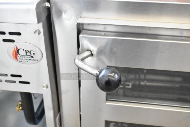 Brand new Avantco 177DPO18DSM stainless steel double deck pizza oven, with digital controls and visible handle detailing.