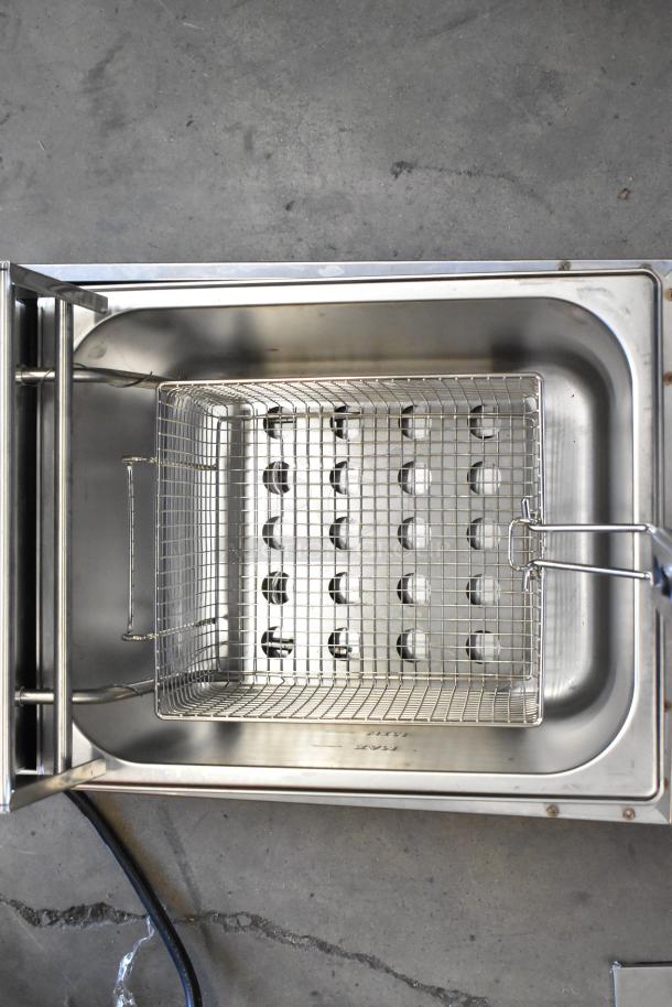 Zokop EH81 stainless steel countertop electric fryer, includes metal fry basket and lid. Features single bay, 110 volts, 1 phase.
