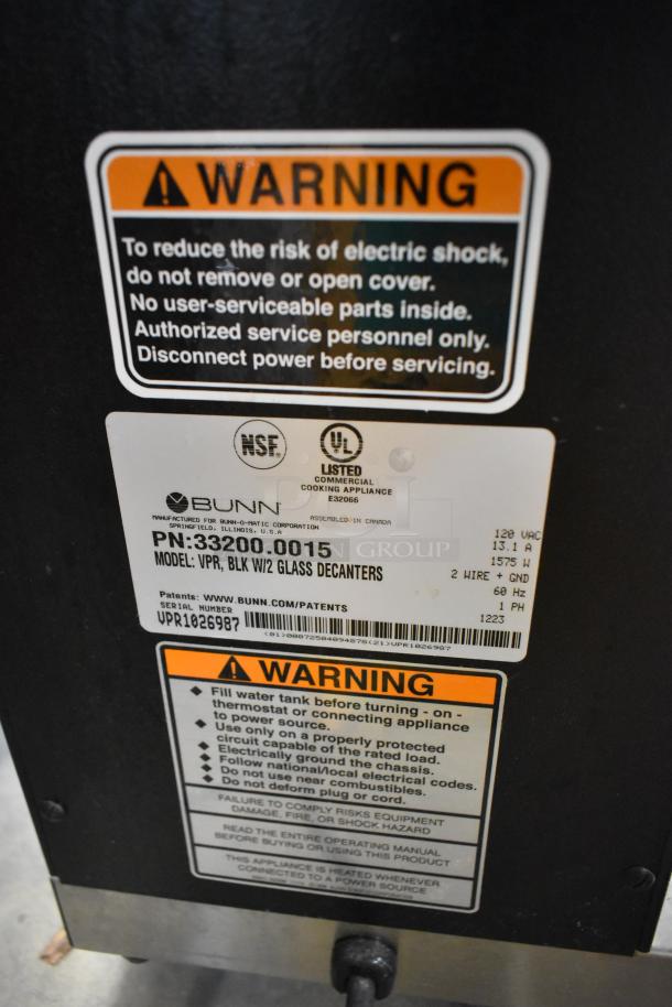 2023 Bunn VPR 2 Burner Coffee Machine with stainless steel finish. Features warning labels, 120V, 1 Phase. Model PN: 33200.0015.