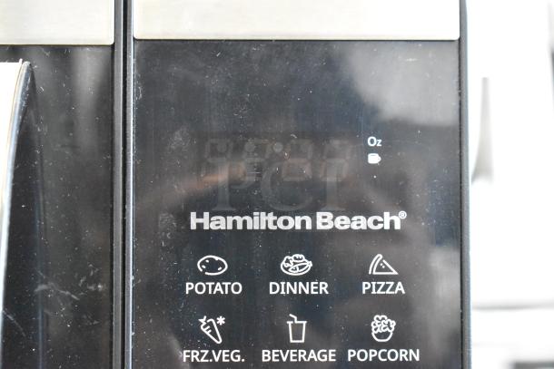 Hamilton Beach HB4302797514-01 countertop microwave oven, preset settings, black finish, visible logo, 120 volts.