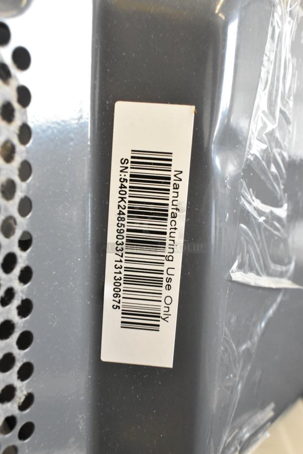 Hamilton Beach HB4302797514-01 microwave, 120V, shows manufacturing use label with barcode and serial number.
