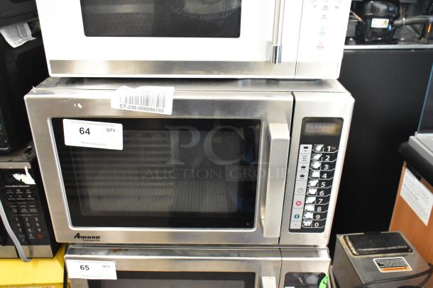 2017 Amana RCS10TS stainless steel commercial countertop microwave, 120V. Features keypad, minor surface wear, auction tag visible.