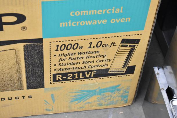 IN ORIGINAL BOX! Sharp R-21LVF countertop microwave, 1000W, 1.0 cu. ft., stainless steel cavity, auto-touch controls, 120V.
