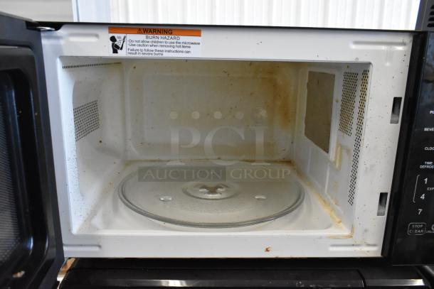 Hamilton Beach HB8436127995-01 commercial microwave oven, stainless steel, visible interior wear, 120 volts, 1 phase.