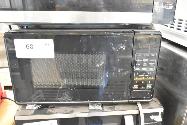 Hamilton Beach MS8436127995-01 stainless steel commercial microwave, visible wear, 120 volts, 1 phase. Label 68 on door.