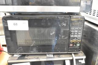 Hamilton Beach MS8436127995-01 stainless steel commercial microwave, visible wear, 120 volts, 1 phase. Label 68 on door.