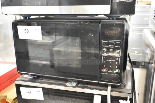 Hamilton Beach MS8436127995-01 commercial microwave oven, stainless steel, 120V, 1 phase, digital controls, visible wear.