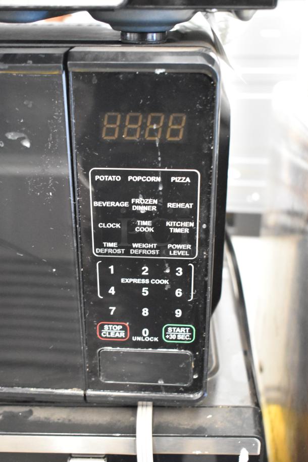 Hamilton Beach MS8436127995-01 stainless steel commercial microwave, keypad with preset functions, 120 volts, used condition.