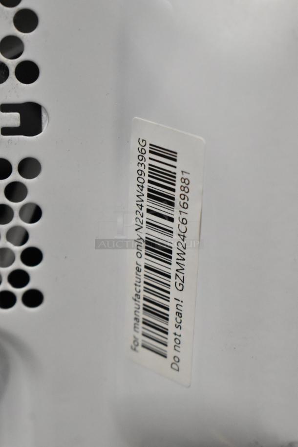 Hamilton Beach MS8436127995-01 microwave oven showing a label with barcode for manufacturer use only. 120V, 1 Phase.