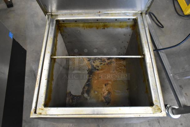402 Metal Commercial Portable Fryer Oil Filter, model 402, showing interior wear. 120V, 1 Phase. Suitable for filtering fryer oil.