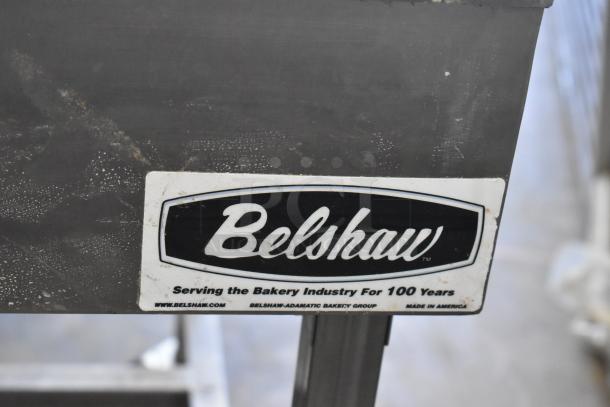 2023 Belshaw H&I-4 glazing station, stainless steel, on commercial casters. Label indicates 208-240V, 1 phase.